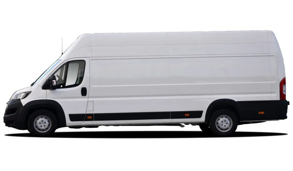 A white hi-top campervan with an elevated roof, seen side-on against a plain background