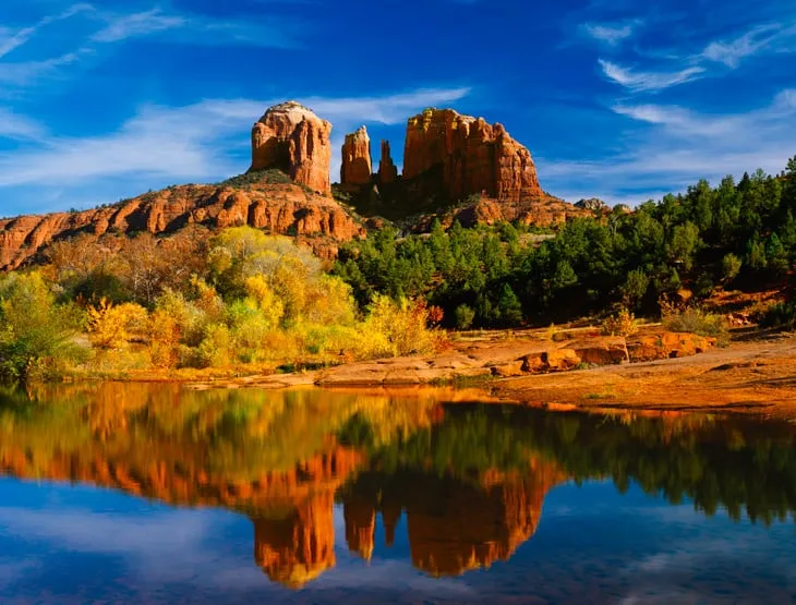 Oak Creek reflects Cathedral Peaks in Red Rocks State Park