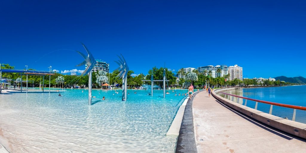 The Esplanade in Cairns with swimming lagoon and the ocean, Queensland, Australia